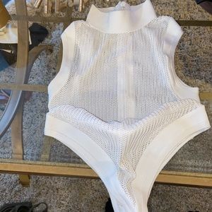 Sheer white, netted bodysuit